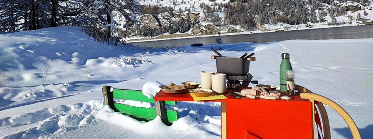 In Canton Grigioni la fonduta si mangia sulla slitta